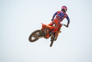 How Do Motocross Riders Jump Safely? Expert Tips and Techniques