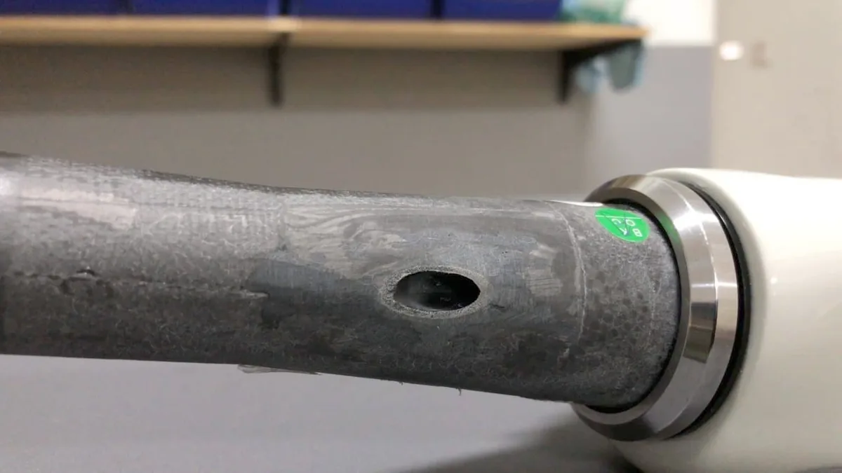 brake cable wrapped around fork