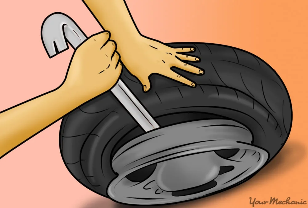 Breaking Down the Process: Removing the Old Tire and Tube