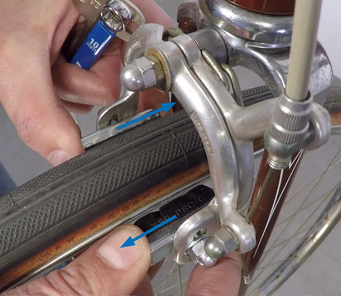 frayed brake cable at caliper anchor