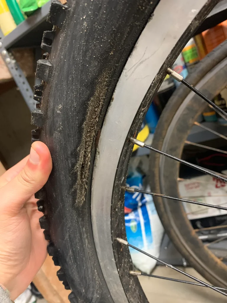 kids bike tire keeps coming off