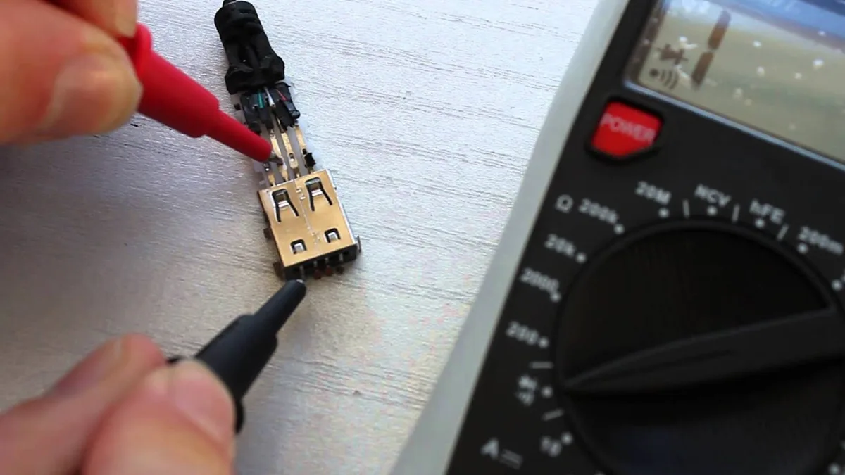 multimeter testing charger output voltage