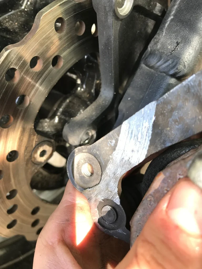 scooter brake rubbing